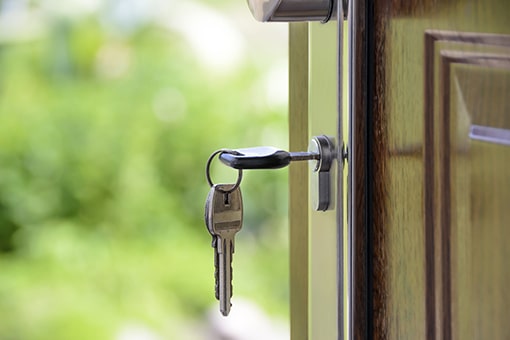 A key hanging to the door